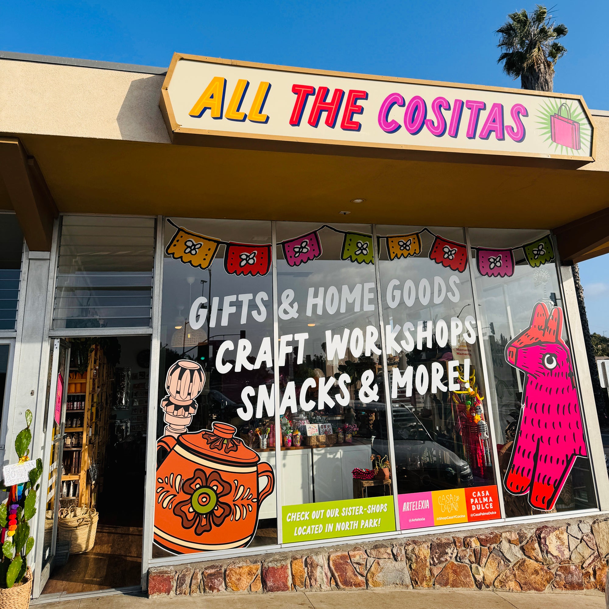 Photo of All The Cositas storefront windows