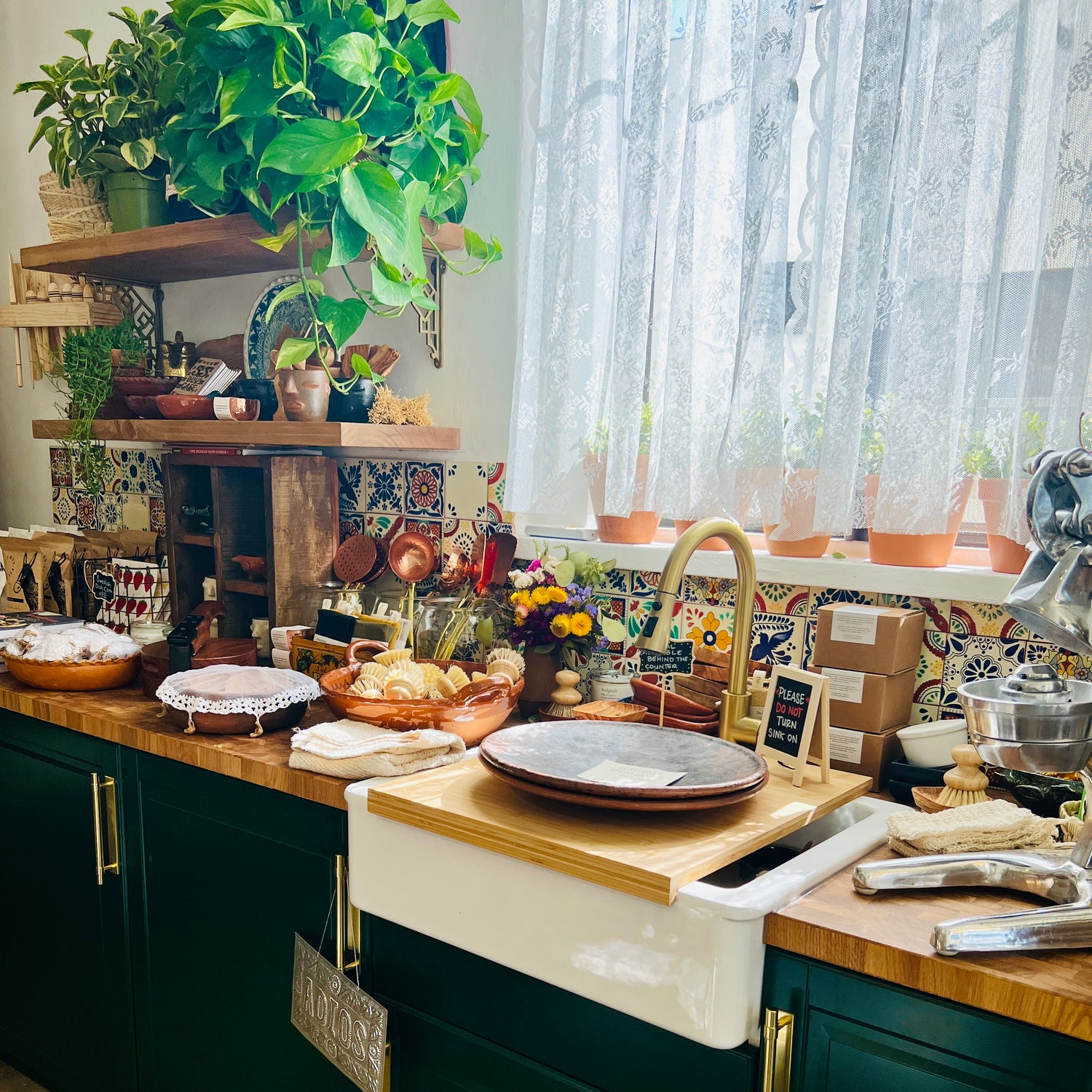 Kitchen counter displaying products for sale inside Casa Y Cocina